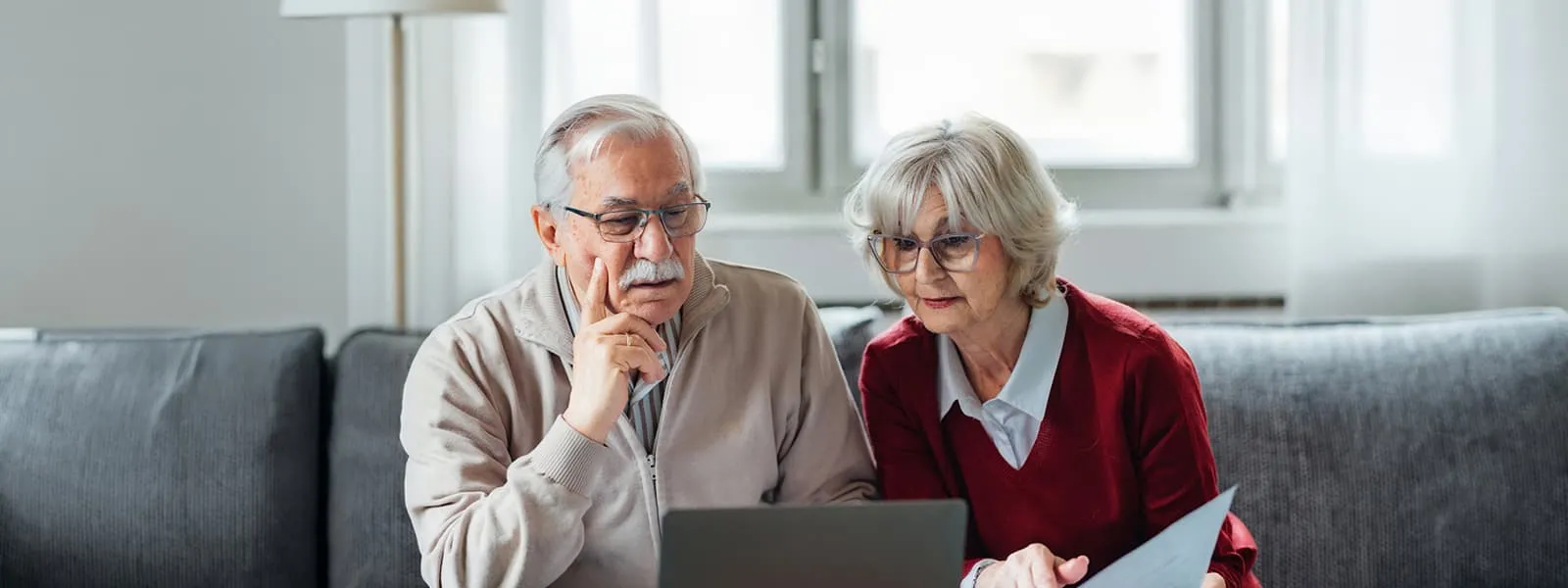 couple reading about cash value