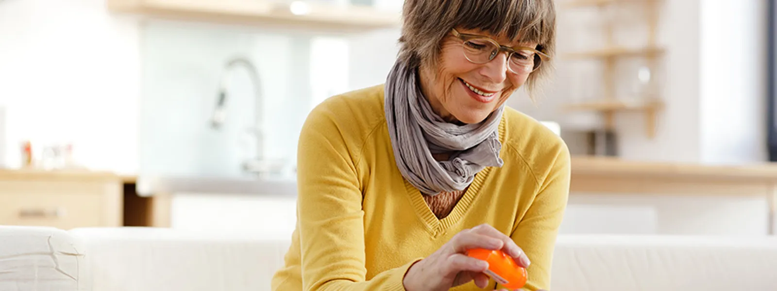 Senior woman taking her prescription medicine.