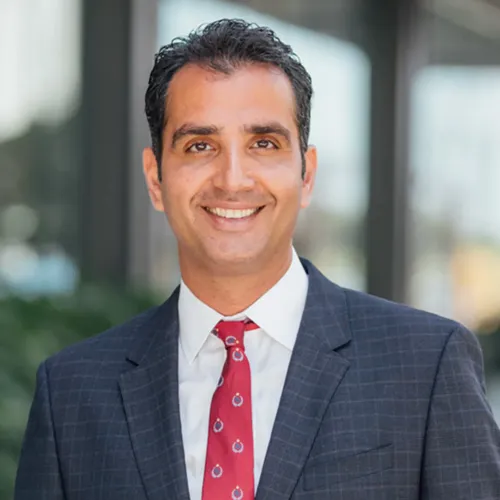 A man smiling at the camera