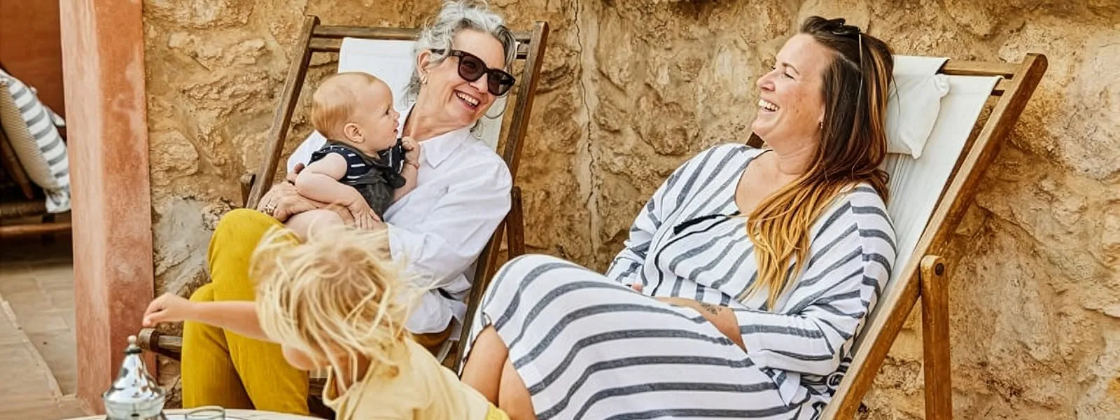 Image of grandmother with her daughter and grandchildren