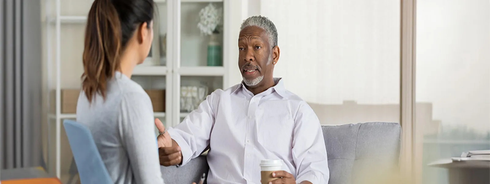 Man talking to therapist