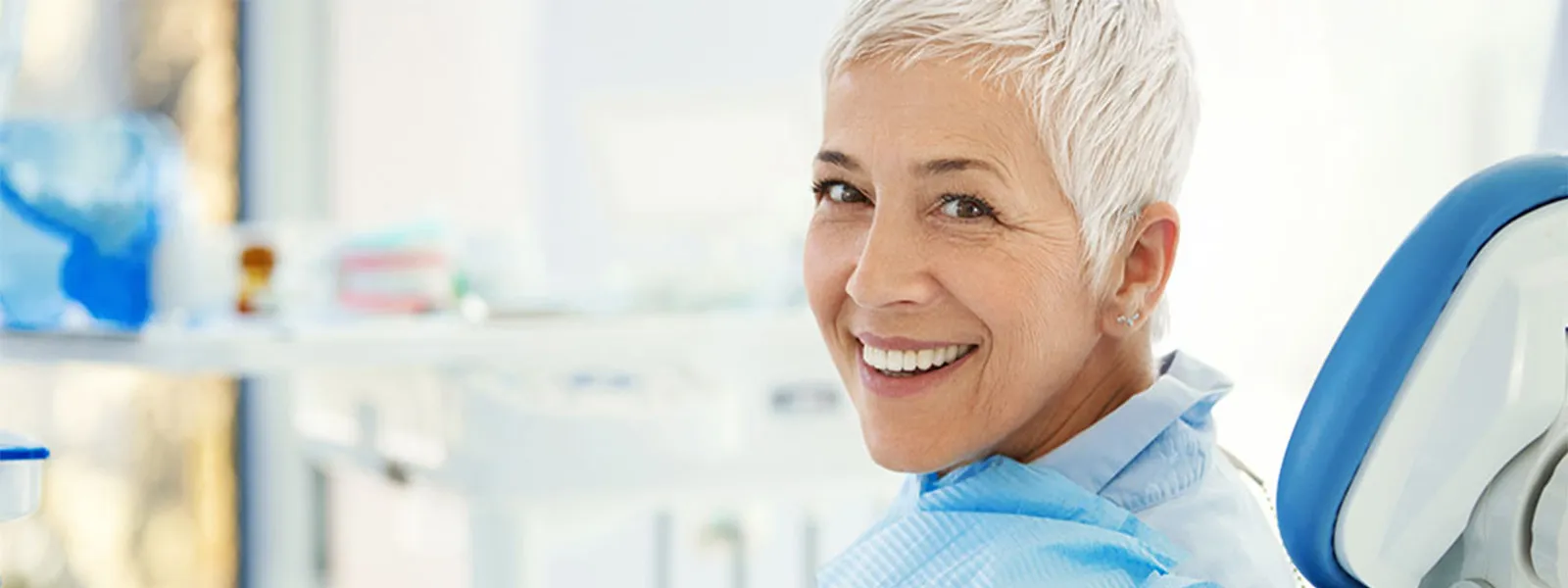 Senior woman at the dentist office.