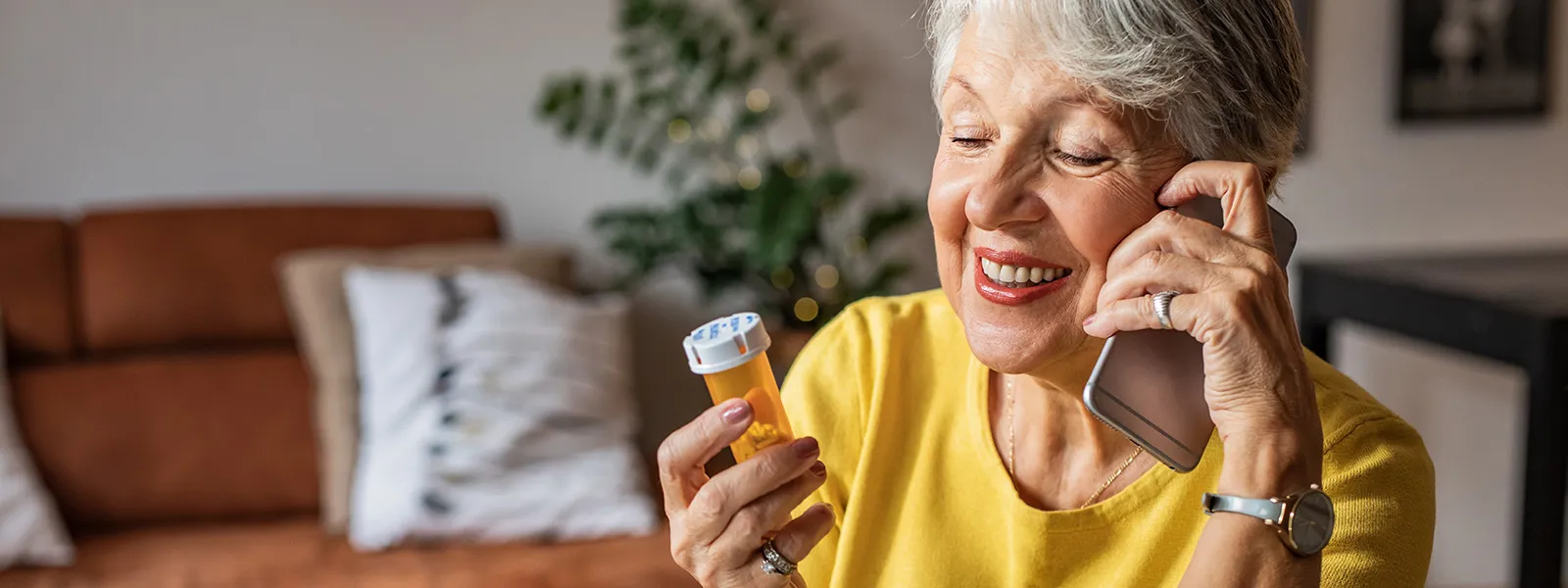 Senior woman taking her prescription medicine.