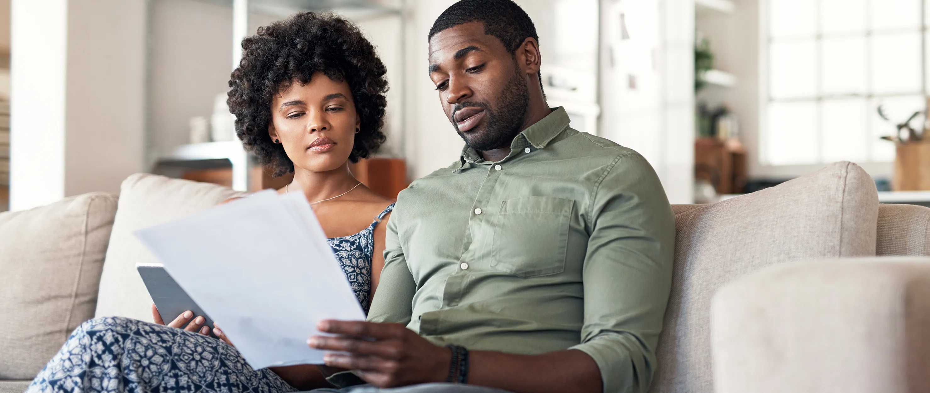 A couple evaluates their option for getting life insurance after a cancer diagnosis