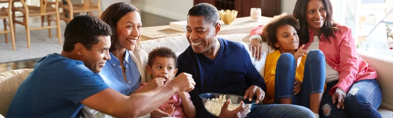Family sitting on couch