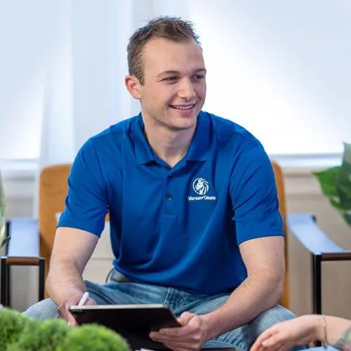Financial Representative Sitting with Ipad