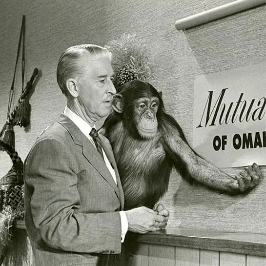 Marlin Perkins holding chimp