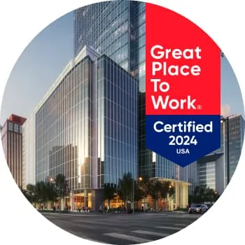 The Mutual of Omaha new headquarters building with a text banner that says 'Great place to work. Certified 2024 USA'