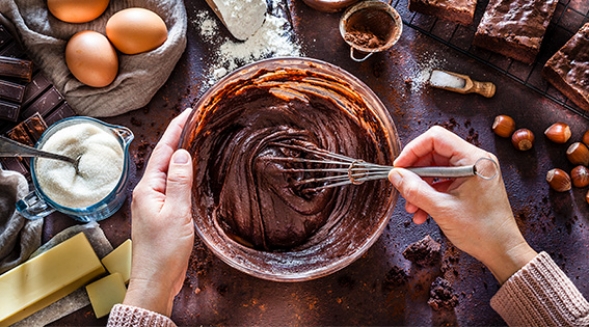 caking batter in a mixing bowl