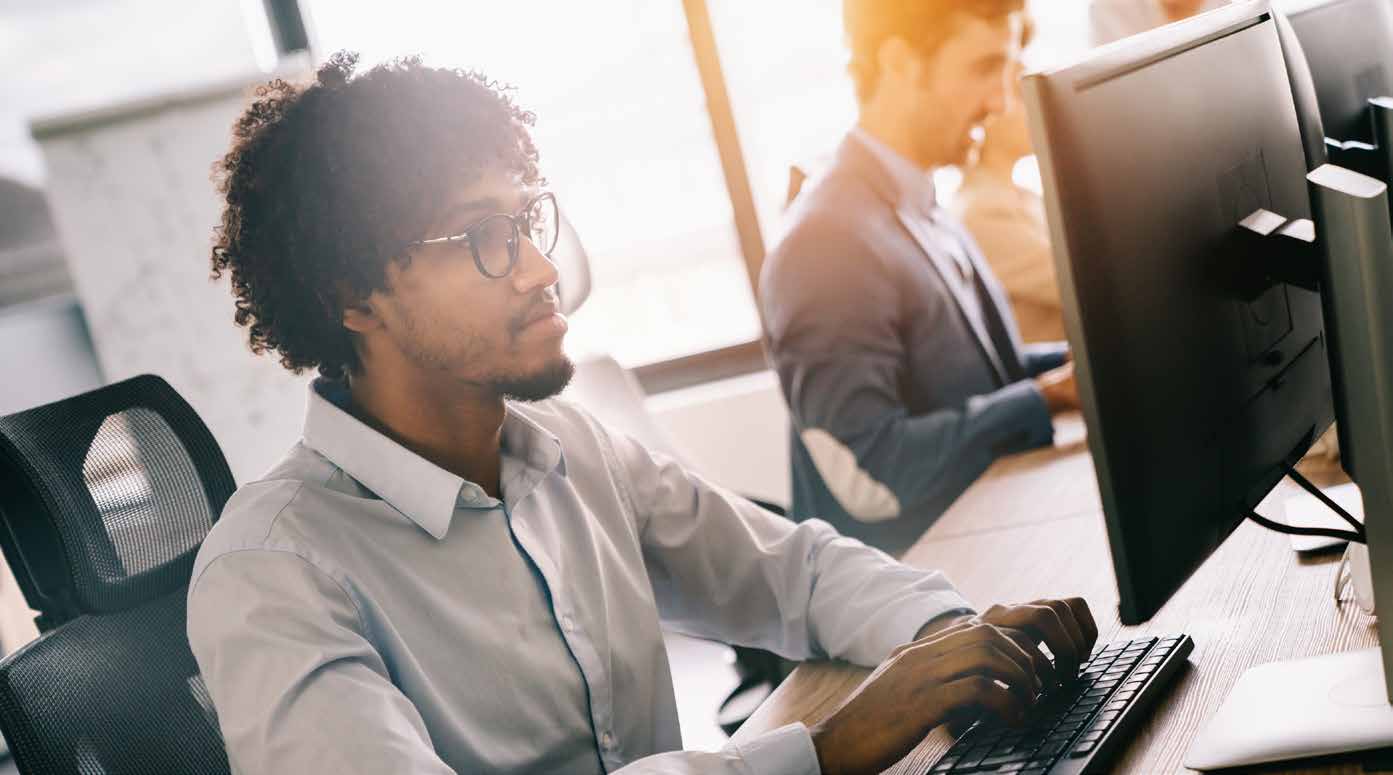 man at computer working