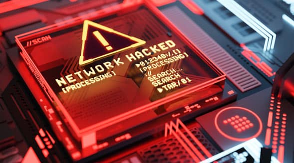 computer chip labeled network hacked