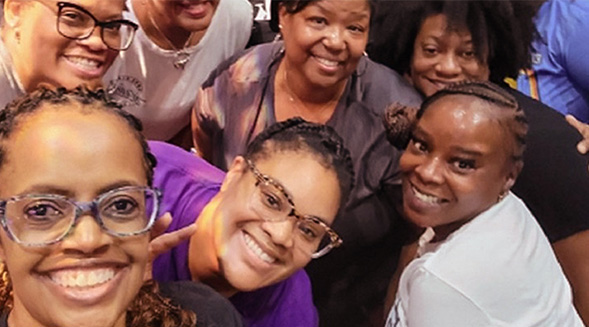 group of people smiling at the camera