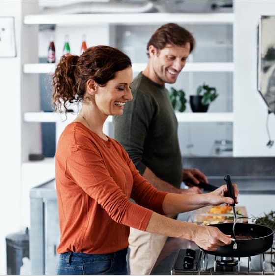 couple cooking together