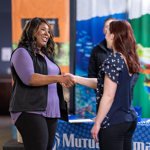 Women shaking hands