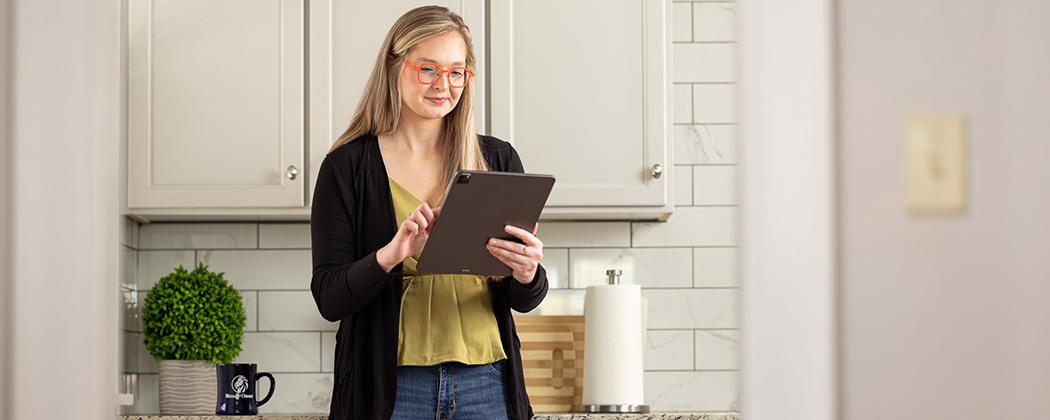 Woman looking at notebook