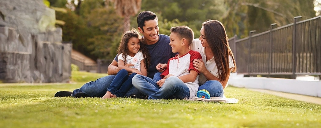 family at the park happy