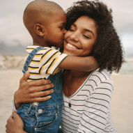 Term life insurance customer, Lisa embraces her young son