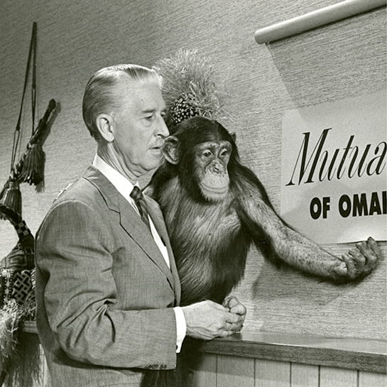 Marlin Perkins holding chimp