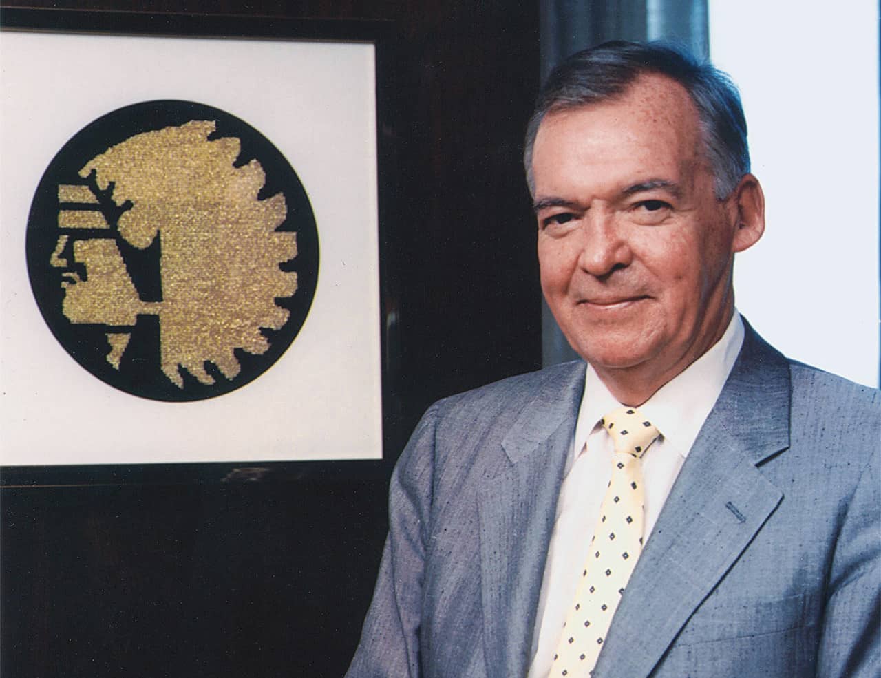 Tom Skutt Mutual's gold logo in 1984