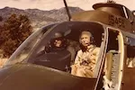 Thumbnail - Marlin Perkins boards a helicopter while filming Wild Kingdom